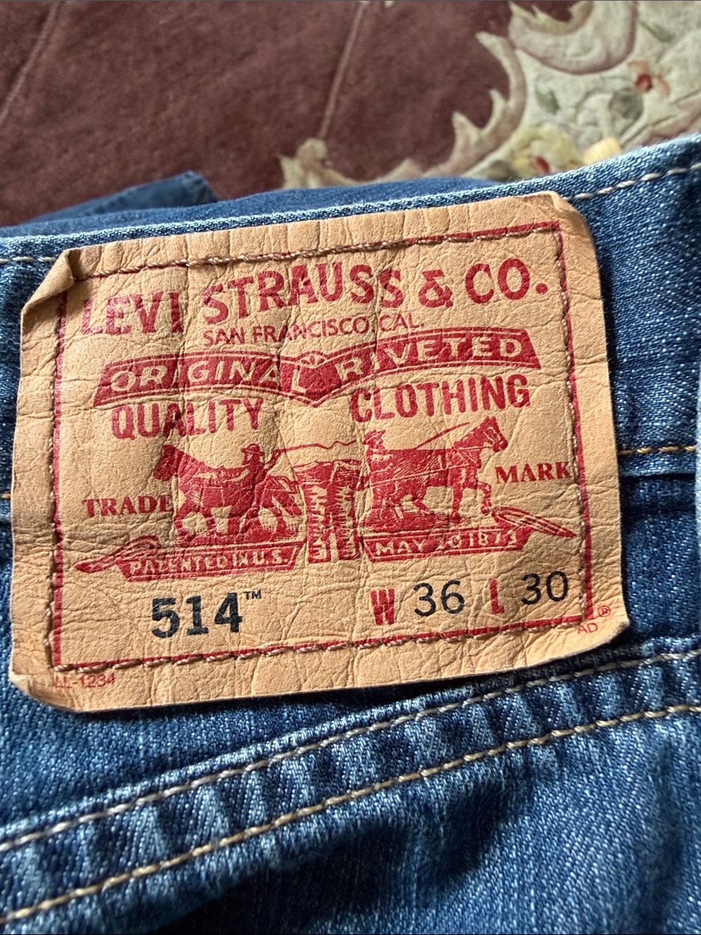 Levi's 514 Slim Straight Jeans in Blue with Tan Patch